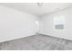 Bright and airy bedroom with plush carpet, neutral walls, and a sunny window at 2715 Stream Valley Lane Nw Nw Cir, Atlanta, GA 30318