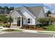A well-maintained community clubhouse with manicured lawns and landscaping provides a welcoming and attractive amenity at 2715 Stream Valley Lane Nw Nw Cir, Atlanta, GA 30318