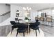 Dining area adjacent to the kitchen and staircase, perfect for Gathering meals at 2715 Stream Valley Lane Nw Nw Cir, Atlanta, GA 30318