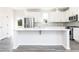 Spacious kitchen features a large island perfect for entertaining, stainless appliances, and modern lighting at 2715 Stream Valley Lane Nw Nw Cir, Atlanta, GA 30318