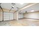 The spacious three car garage provides parking and storage at 9109 Alden Dr, Locust Grove, GA 30248