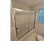 Bathroom featuring tub/shower combo and patterned floors at 2681 Aquamist Dr, Decatur, GA 30034