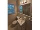 Bathroom featuring tub/shower combo, vanity, and patterned floors at 2681 Aquamist Dr, Decatur, GA 30034