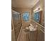Bathroom featuring tub/shower combo, vanity, and patterned floors at 2681 Aquamist Dr, Decatur, GA 30034