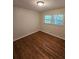 Bedroom featuring natural light from window and hardwood floors at 2681 Aquamist Dr, Decatur, GA 30034