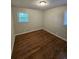 Bedroom featuring natural light from window and hardwood floors at 2681 Aquamist Dr, Decatur, GA 30034