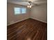 Bedroom featuring beautiful hardwood floors and a ceiling fan at 2681 Aquamist Dr, Decatur, GA 30034