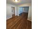 Open dining room with hardwood floors, neutral walls, and ample space for entertaining at 2681 Aquamist Dr, Decatur, GA 30034