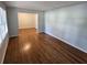 Inviting living room featuring gleaming hardwood floors, ample natural light, and a neutral color palette at 2681 Aquamist Dr, Decatur, GA 30034