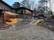 Backyard view with patio furniture, terraced landscaping, and walkway at 3504 Palace Ct, Tucker, GA 30084