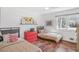 Cozy bedroom with twin beds, hardwood floors, and bright natural light at 3504 Palace Ct, Tucker, GA 30084