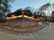 Exterior of brick home with professional landscaping and hardscape including stone paths, providing outdoor elegance at 3504 Palace Ct, Tucker, GA 30084