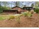 Beautifully landscaped backyard featuring outdoor patios and lush greenery at 3504 Palace Ct, Tucker, GA 30084