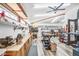 Bright and spacious garage equipped with work tables and storage shelves, offering ample space for projects at 3504 Palace Ct, Tucker, GA 30084