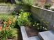 Unique terraced landscaping with retaining walls and diverse plants at 3504 Palace Ct, Tucker, GA 30084