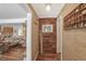 Foyer with hardwood floors, featuring a coat rack and decoratively paneled accent wall at 3504 Palace Ct, Tucker, GA 30084