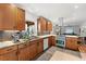 Well-lit kitchen features stainless steel appliances, granite countertops, and ample cabinet space at 3504 Palace Ct, Tucker, GA 30084