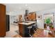 Spacious kitchen with central island, stainless steel appliances, and wood cabinetry at 3504 Palace Ct, Tucker, GA 30084