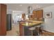 Modern kitchen with granite countertops, stainless steel appliances, and bar stool seating at 3504 Palace Ct, Tucker, GA 30084