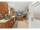 Well-lit kitchen features stainless steel appliances, granite countertops, and ample cabinet space at 3504 Palace Ct, Tucker, GA 30084