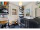 Organized laundry room with shelving, washer, dryer and access to outside at 3504 Palace Ct, Tucker, GA 30084