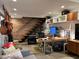 Eclectic living room featuring guitars, floating stairs, and a workstation at 3504 Palace Ct, Tucker, GA 30084