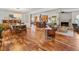 Open living and dining area with hardwood floors, recessed lighting, and modern decor at 3504 Palace Ct, Tucker, GA 30084