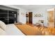 Spacious main bedroom with hardwood floors and large windows overlooking the backyard at 3504 Palace Ct, Tucker, GA 30084