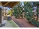 View of the back patio, surrounded by lush trees at 109 Bridlington St, Sugar Hill, GA 30518