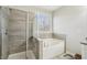 Primary bathroom with a tiled shower and separate soaking tub at 109 Bridlington St, Sugar Hill, GA 30518