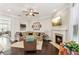 Cozy living room with a fireplace and comfortable seating area at 109 Bridlington St, Sugar Hill, GA 30518