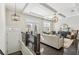 Bright living room with coffered ceilings, hardwood floors, and stylish decor at 109 Bridlington St, Sugar Hill, GA 30518