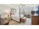 Elegant bedroom features tray ceilings, canopy bed, and a sitting area at 109 Bridlington St, Sugar Hill, GA 30518