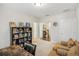 Office featuring a large desk, shelving, and comfortable seating at 109 Bridlington St, Sugar Hill, GA 30518