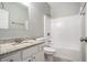 Bathroom featuring a granite vanity countertop, a toilet, and a tiled shower with a tub at 441 Concord Cir, Mcdonough, GA 30253