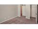 Bedroom with neutral walls, carpet flooring and an open doorway to the closet at 441 Concord Cir, Mcdonough, GA 30253