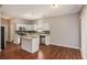 Updated kitchen featuring white cabinets, granite countertops, and stainless steel appliances at 441 Concord Cir, Mcdonough, GA 30253
