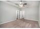 Large carpeted main bedroom with a tray ceiling and doors to the bathroom and closet at 441 Concord Cir, Mcdonough, GA 30253