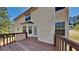 Outdoor deck, perfect for relaxing or entertaining, with wooden railings and views of the backyard at 45 Kirkland Ct, Covington, GA 30016