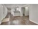 Spacious basement area with bar, modern lighting, and sleek floors at 45 Kirkland Ct, Covington, GA 30016