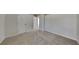 Bright bedroom features neutral carpeting and paint scheme with an ensuite bath at 45 Kirkland Ct, Covington, GA 30016