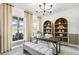 Bright home office with natural light, desk, shelving, and comfortable seating at 3136 Morris Hills Dr, Dacula, GA 30019