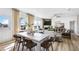 Open floor plan featuring a dining area, living room, and natural light at 3136 Morris Hills Dr, Dacula, GA 30019