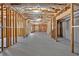 Unfinished basement space with wood framing and concrete floor at 511 Millwood Ct, Canton, GA 30114