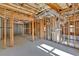 Unfinished basement space featuring exposed ceiling, framing, and sealed concrete floors at 511 Millwood Ct, Canton, GA 30114