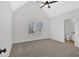 Bright bedroom featuring ceiling fan and large window at 511 Millwood Ct, Canton, GA 30114
