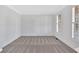Empty bedroom featuring carpet and natural light at 511 Millwood Ct, Canton, GA 30114