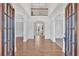 Grand foyer showcasing soaring ceilings, hardwood floors, and architectural details at 511 Millwood Ct, Canton, GA 30114