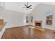Spacious living room with fireplace, hardwood floors, and natural light at 511 Millwood Ct, Canton, GA 30114