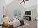 Comfortable main bedroom with ceiling fan, television, and large window at 511 Millwood Ct, Canton, GA 30114